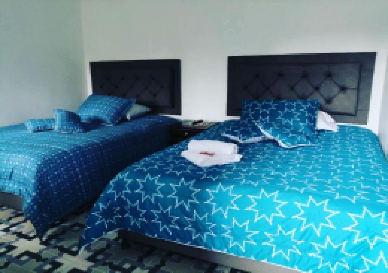 Hotel Vista Farallones Jardín Cameră foto